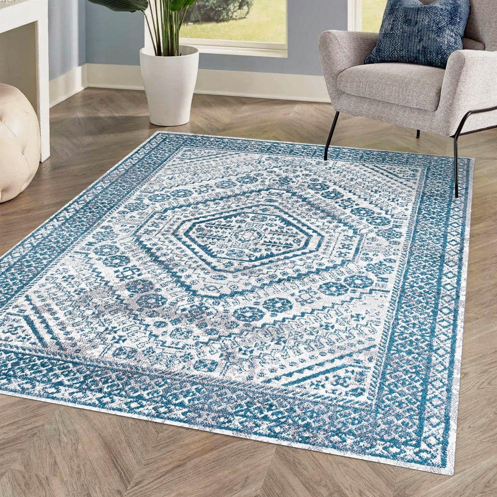 https://images.thdstatic.com/productImages/d1975cd9-b543-413a-83f0-4c5a247d7031/svn/blue-white-jonathan-y-area-rugs-mdp501c-5-64_1000.jpg