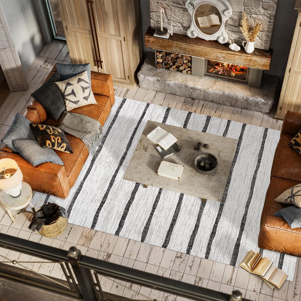 Ivory and Black Striped Synthetic 4' x 6' Indoor/Outdoor Rug