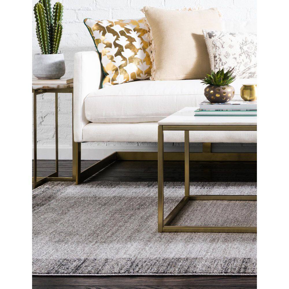 Light Gray 9' x 12' Easy Care Tufted Synthetic Rug