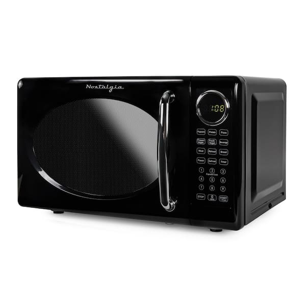 Nostalgia 0.7 cu. ft. Countertop Microwave Oven, white