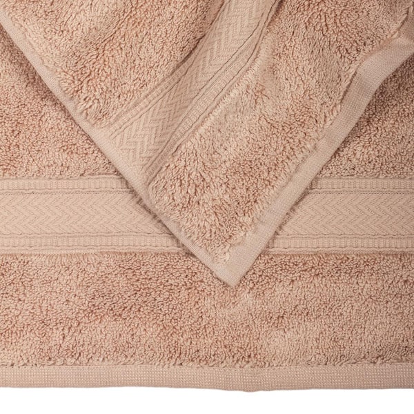 https://images.thdstatic.com/productImages/d1c0ea68-db63-4fe1-9fb1-13f4a0d17dc1/svn/beige-bath-towels-96-137562-4f_600.jpg