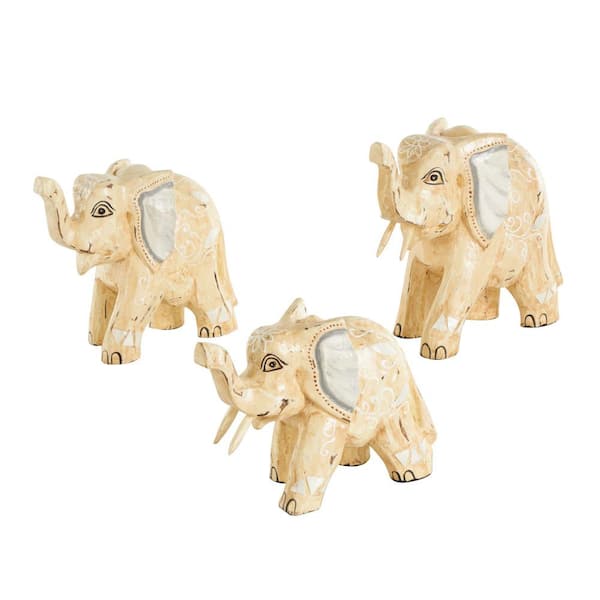 Litton Lane Light Brown Wood Handmade Elephant Sculpture with Scroll and Floral Patterns (Set of 3)