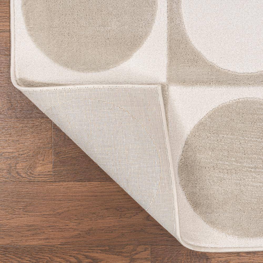 Beige and Cream Geometric High-Low 3' x 5' Area Rug