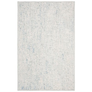Abstract Ivory/Turquoise 6 ft. x 9 ft. Geometric Area Rug