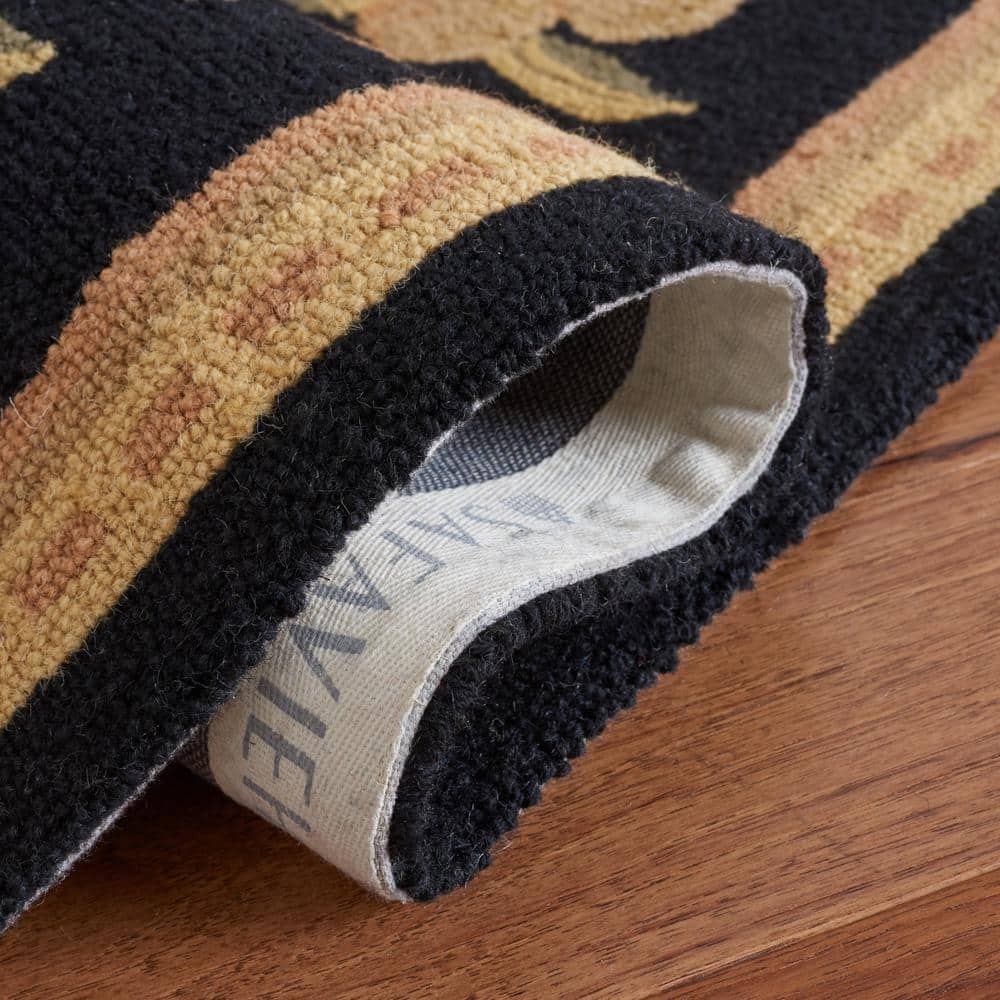 Handmade Black Floral Wool Oval Tufted Rug