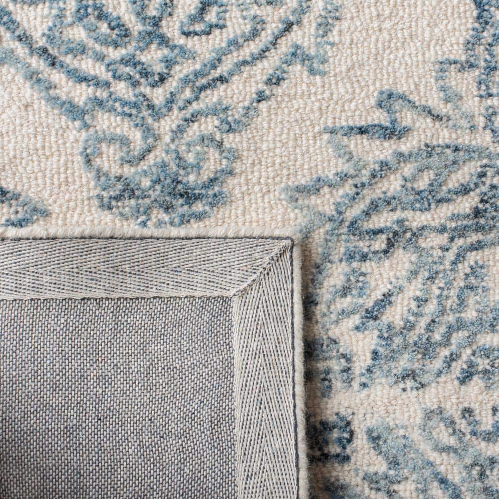 Ivory and Blue Handmade Tufted Wool Abstract Rug