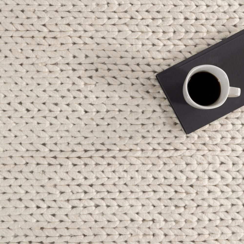 Handmade Off-White Braided Wool 5' x 8' Area Rug