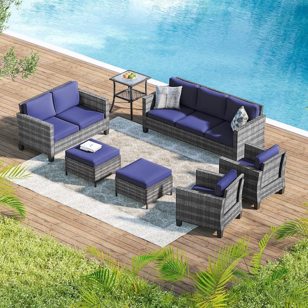 Sonkuki 7-Pieces Patio Conversation Set with Side Table, Outdoor Armchair and Ottomans Gray Wicker with Navy Blue Cushions