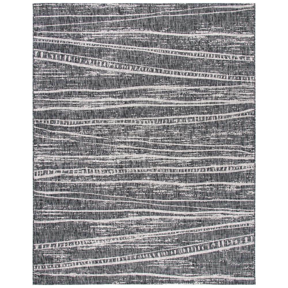 Courtyard Black/Ivory 9 ft. x 12 ft. Abstract Striped Indoor/Outdoor Patio  Area Rug price history on PriceWatchPro