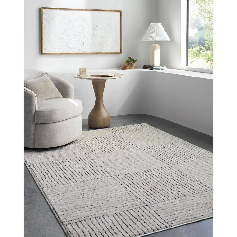 Ivory and Black Geometric Patterned Synthetic Area Rug, 5' x 7'