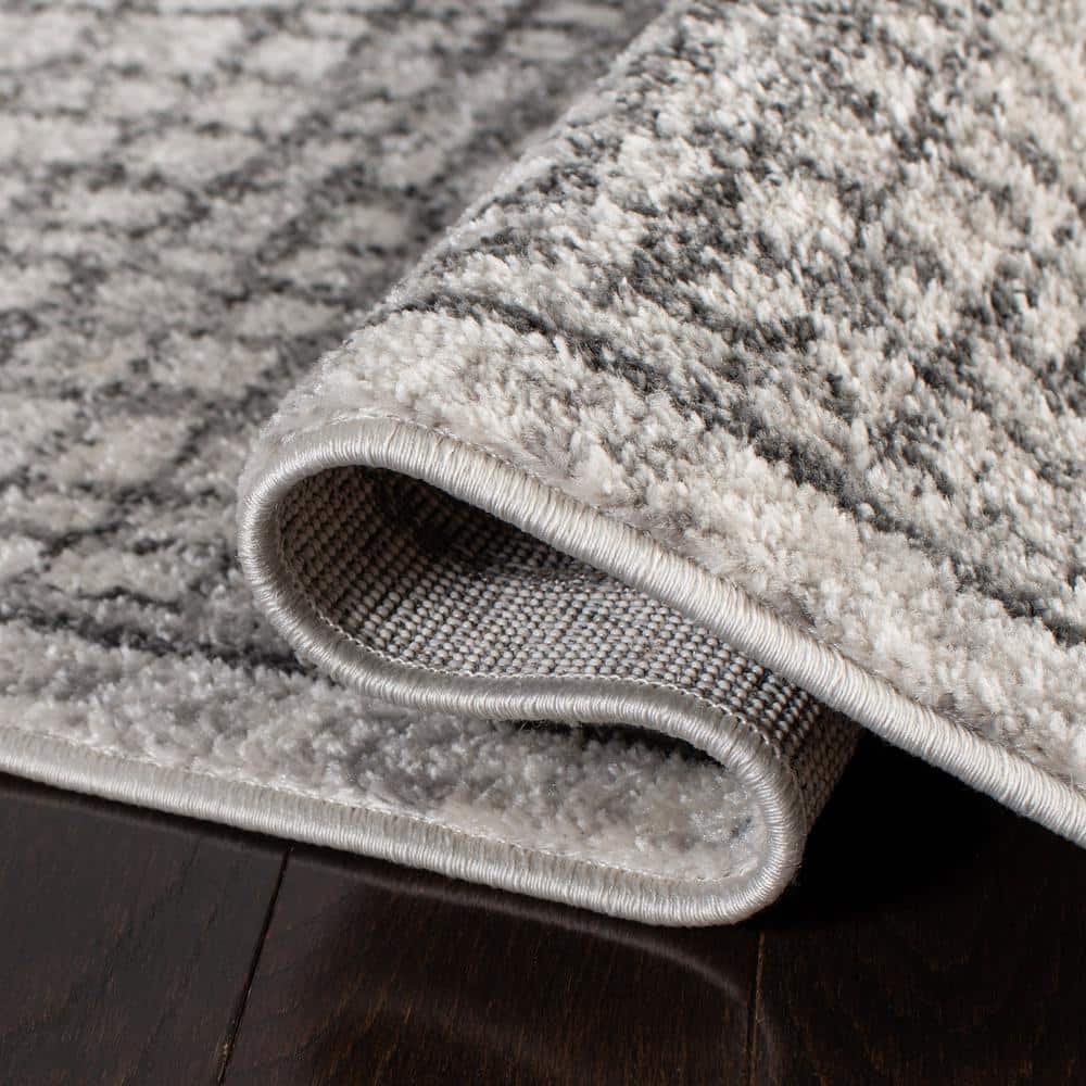 Ivory and Silver Rectangular Synthetic Area Rug, 4' x 6'