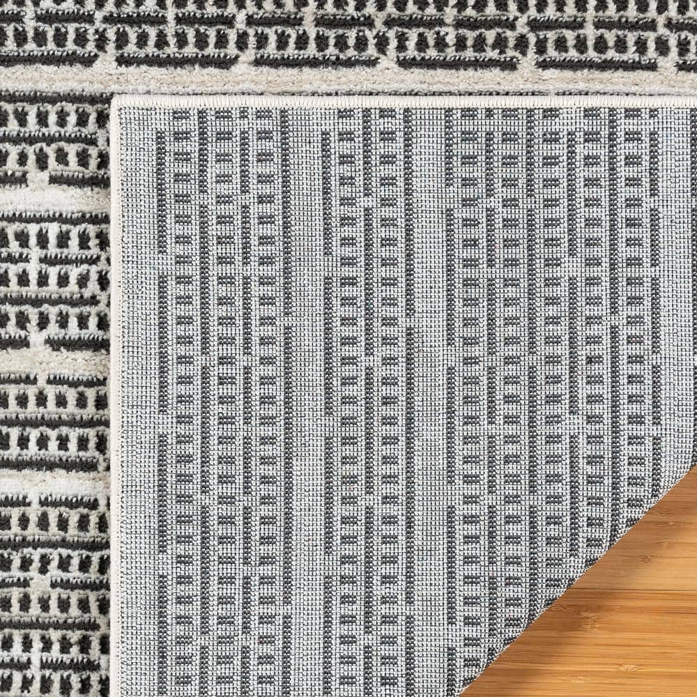 Missha Dario Beige Black Tufted Synthetic 6' x 9' Area Rug
