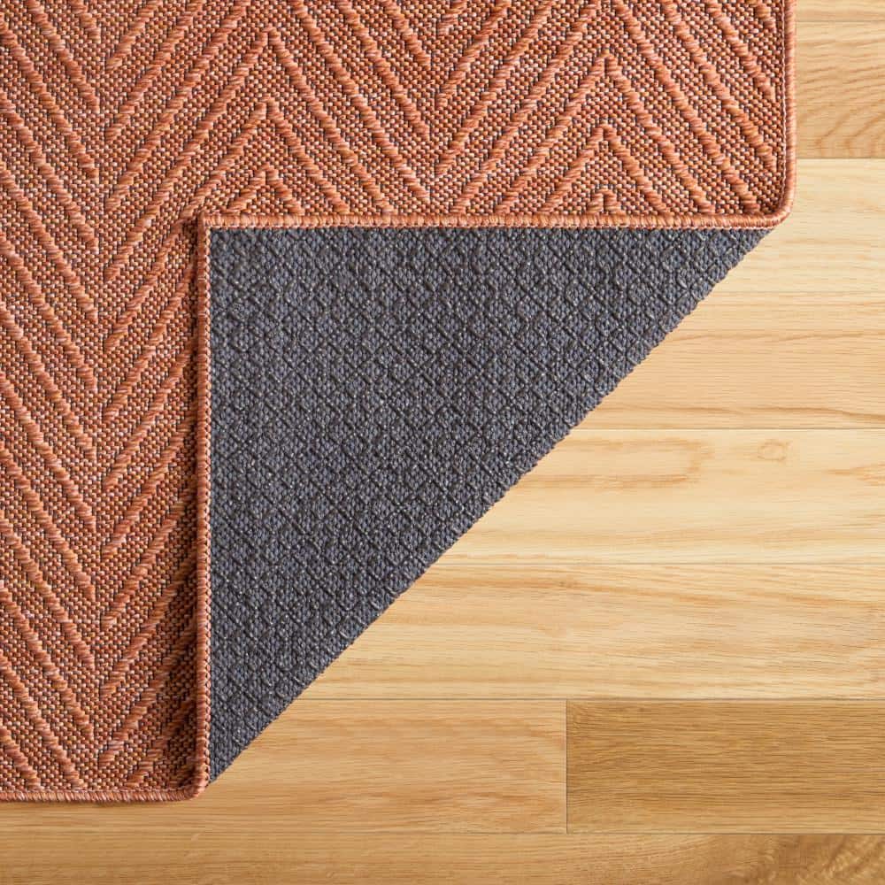 Pax Rust Herringbone Round Washable Area Rug