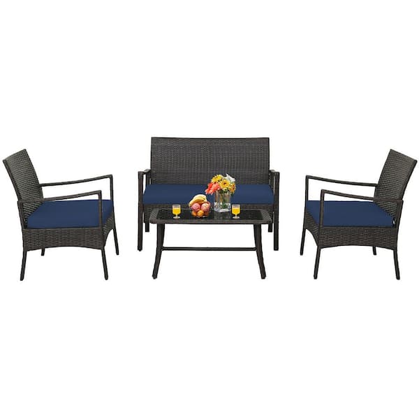 Gymax 4-Pieces Outdoor Patio PE Wicker Sofa with Tempered Glass Coffee Table for Porch and Backyard