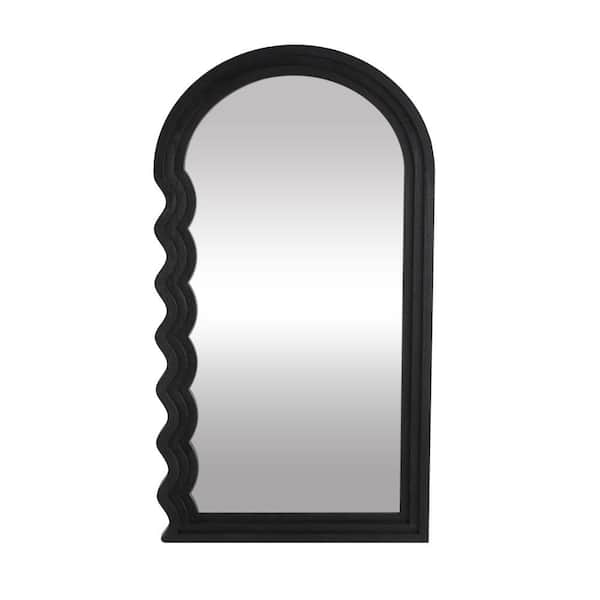 Litton Lane 51 in. x 28 in. Handmade Wavy Arched Framed Black Wall Mirror with Dimensional Carved Frame