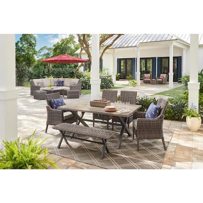 Rock Cliff 6-Piece Brown Wicker Outdoor Patio Dining Set with Bench and CushionGuard Riverbed Tan Cushions