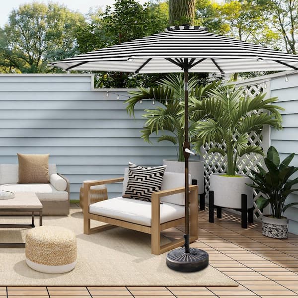 Peyton 9 ft. Market Patio Umbrella in Black and White with Bronze Round Base
