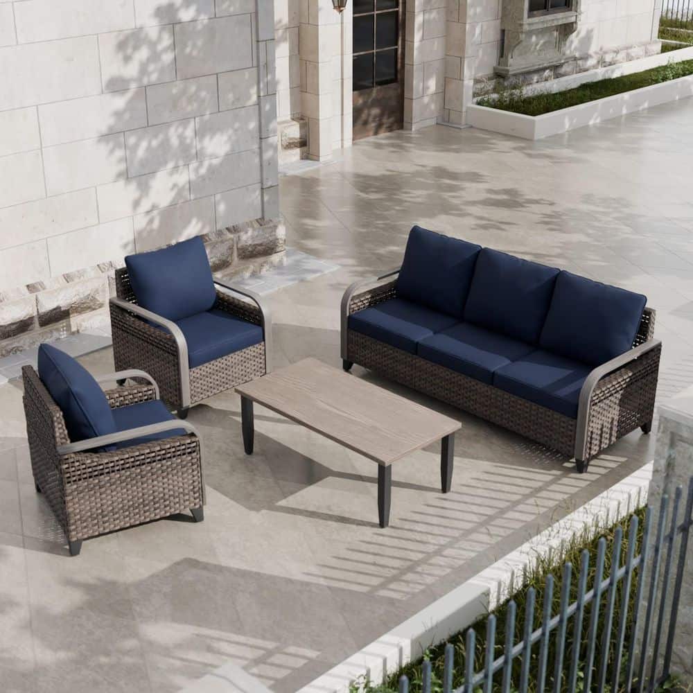 4-Piece Brown Wicker Outdoor Patio Conversation Set 3-Seat Sofa, Lounge Chairs with Blue Cushions and Coffee Table
