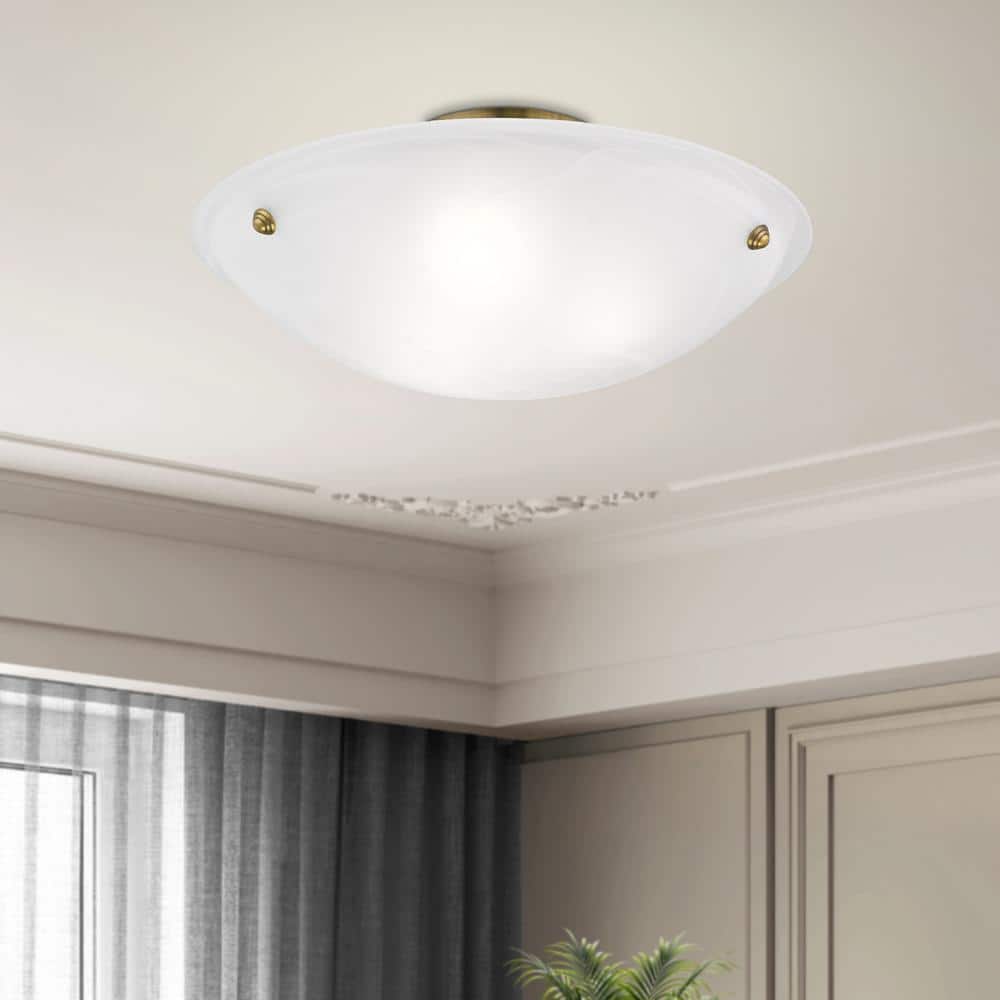 Antique Brass Elegance 3-Light Flush Mount with White Alabaster Glass
