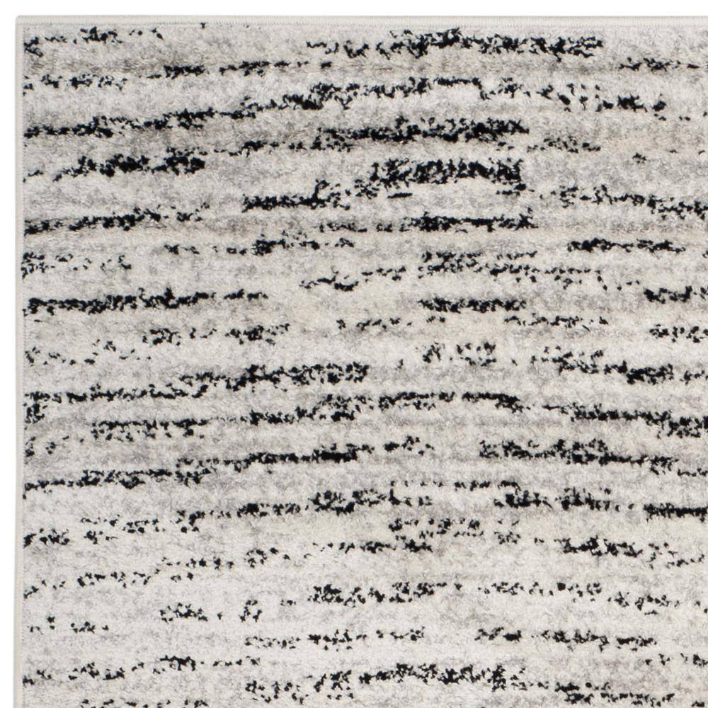 Ivory and Silver Synthetic Rectangle Area Rug, 10' x 14'