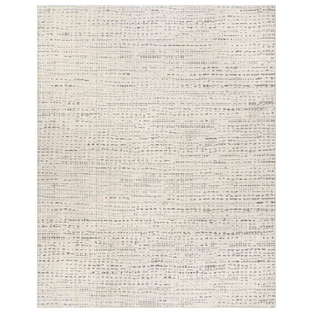 Ivory and Gray Tufted Polka Dot 5' x 7' Synthetic Rug