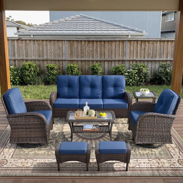 Brown 7-Piece Wicker Patio Conversation Set with Swivel Rockers, Outdoor Sofa Seating Set with Olefin Navy Blue Cushions