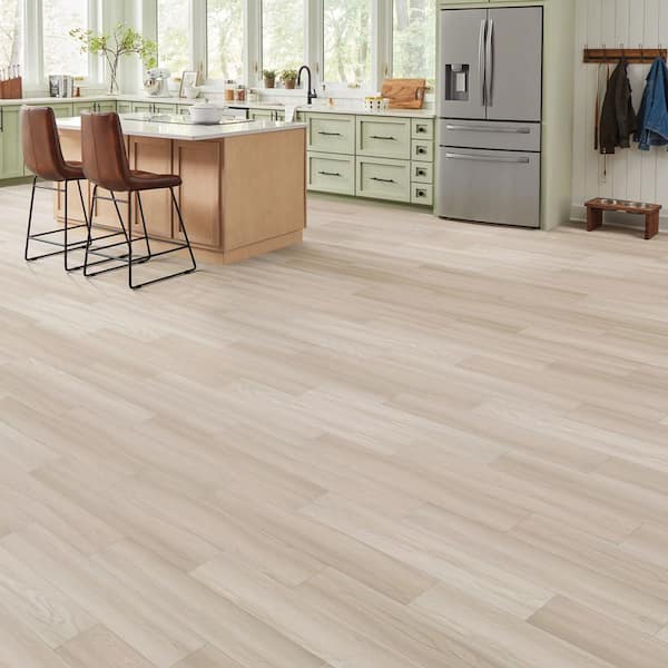 Discover Waterproof LVT at Tile Outlets of America with Kendra