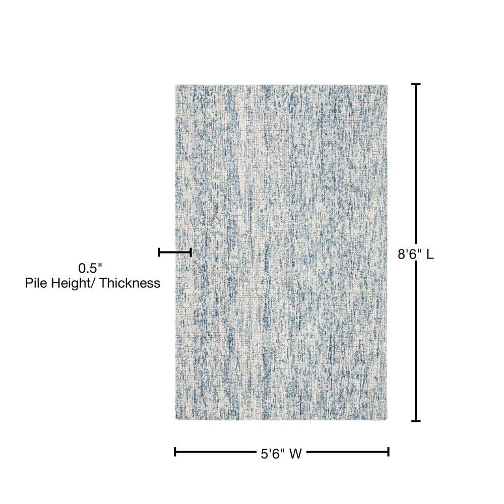 Handmade Ivory Wool Abstract Tufted Area Rug 6' x 9'