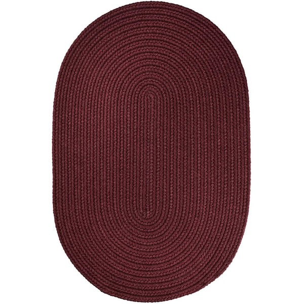 Unbranded Texturized Solid Burgundy Poly 2 ft. x 4 ft. Oval Braided Area Rug