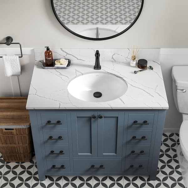 https://images.thdstatic.com/productImages/d2d701f7-8930-5b62-a7c7-77d5a4ed591a/svn/white-kraus-undermount-bathroom-sinks-kcu-272-fa_600.jpg