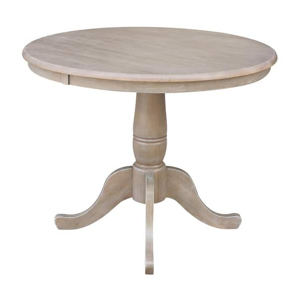 round weathered gray dining table