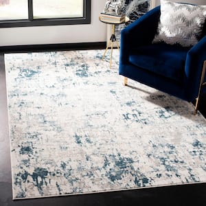 Vogue Beige/Turquoise 5 ft. x 8 ft. Abstract Area Rug
