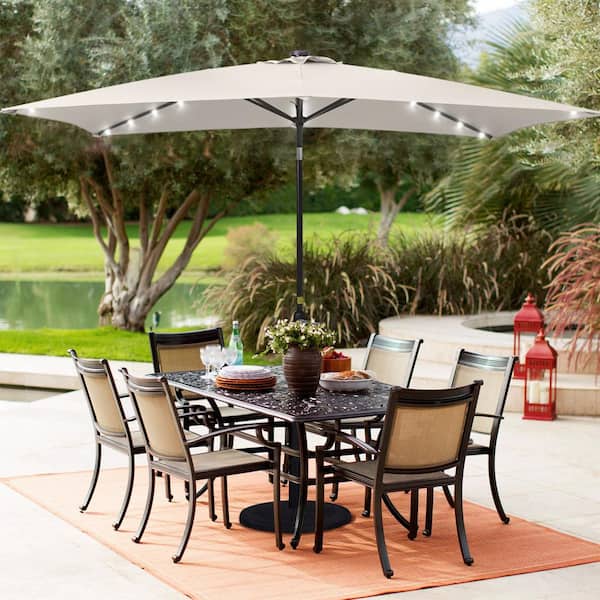 Sonkuki 10 ft. x 6.5 ft. Rectangle Solar LED Outdoor Patio Market Table Umbrella with Push Button Tilt and Crank in Beige