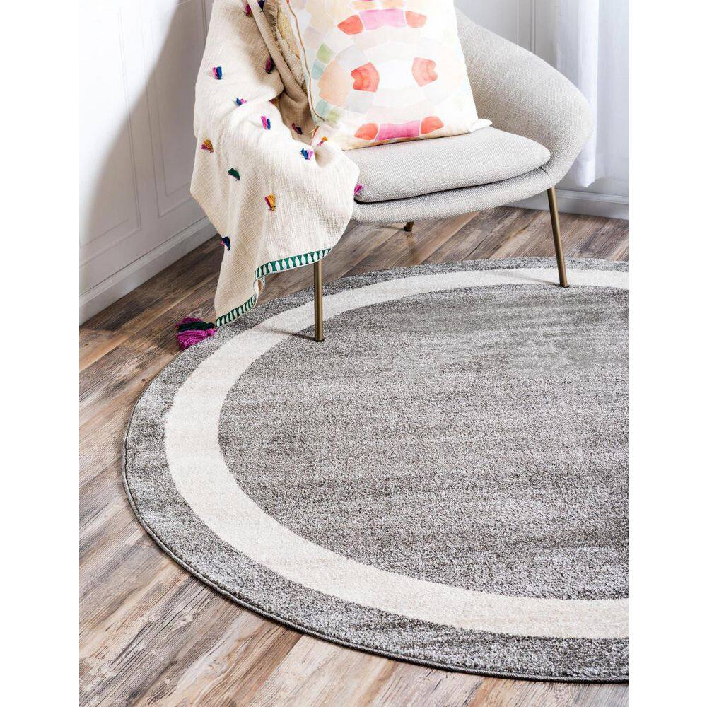 Gray and Ivory Round Tufted Synthetic Rug, 8'