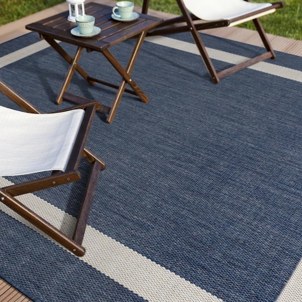 https://images.thdstatic.com/productImages/d31d60af-f158-403c-93b2-0a2af7462436/svn/blue-white-camilson-outdoor-rugs-out403-6x9-hd-fa_600.jpg