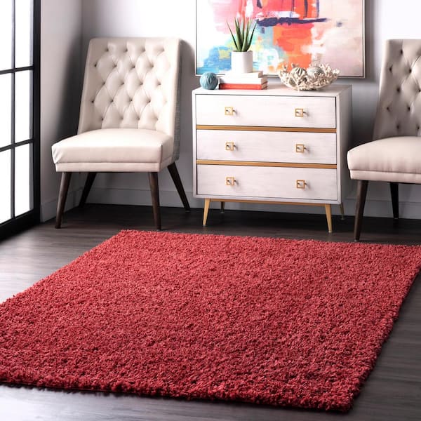 https://images.thdstatic.com/productImages/d328320f-85c6-41e2-a724-212505f71061/svn/red-nuloom-area-rugs-kkbx01j-2808-31_600.jpg