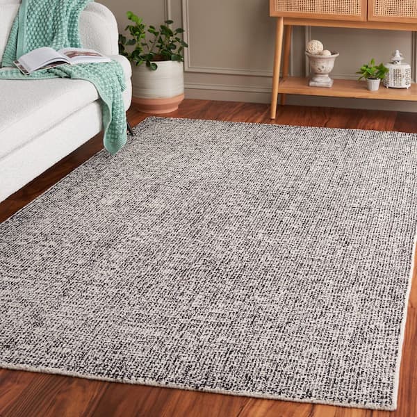 Ebony 9 ft. x 12 ft. Black/Ivory Abstract Noise Area Rug