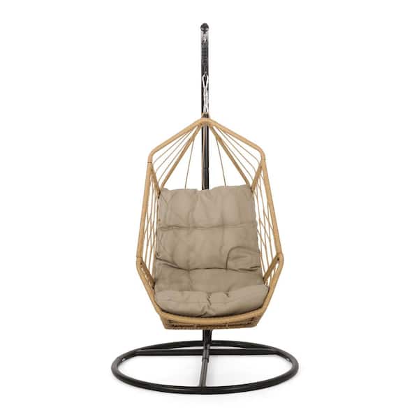 Noble House Purvis 80 in. Light Brown Wicker Outdoor Hanging Chair with Tan Cushion and Stand
