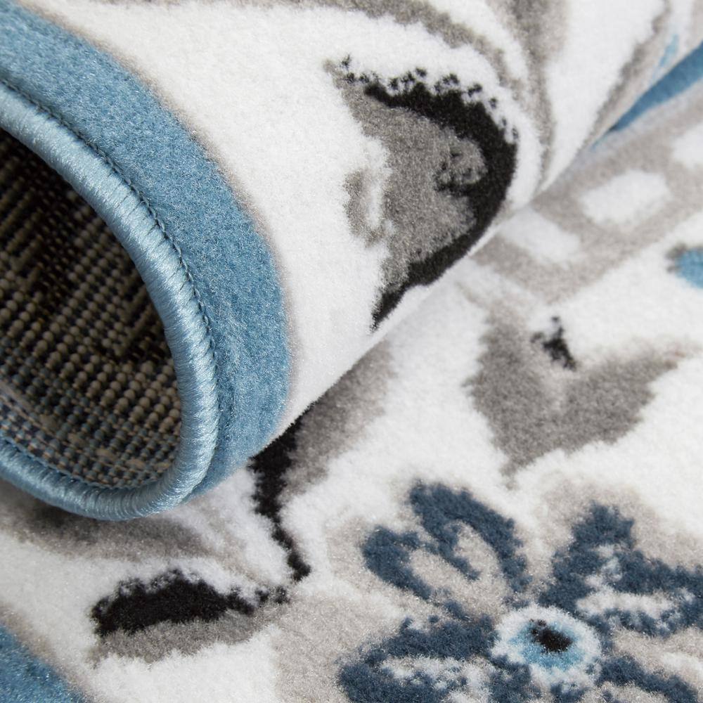 Aydin Blue and Ivory Synthetic Traditional Area Rug