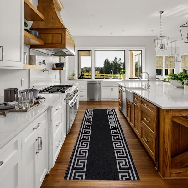 Black Kitchen Runner Rug Between Black and White Cabinets - Soul