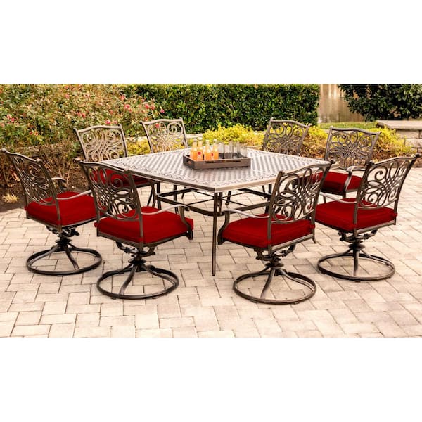 Hanover Traditions 9-Piece Aluminum Outdoor Dining Set with Swivel Rockers with Red Cushions