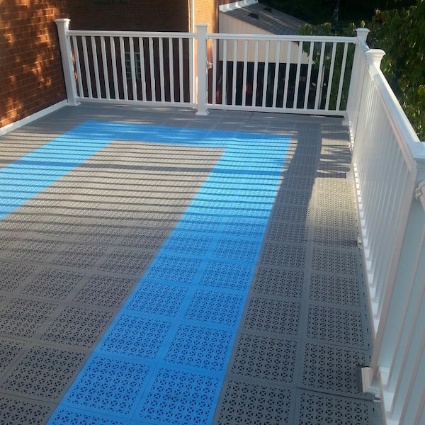 https://images.thdstatic.com/productImages/d3659a83-45bc-4d6b-838b-51430598935f/svn/green-perforated-top-greatmats-gym-floor-tiles-stlp12x12grn26-31_600.jpg