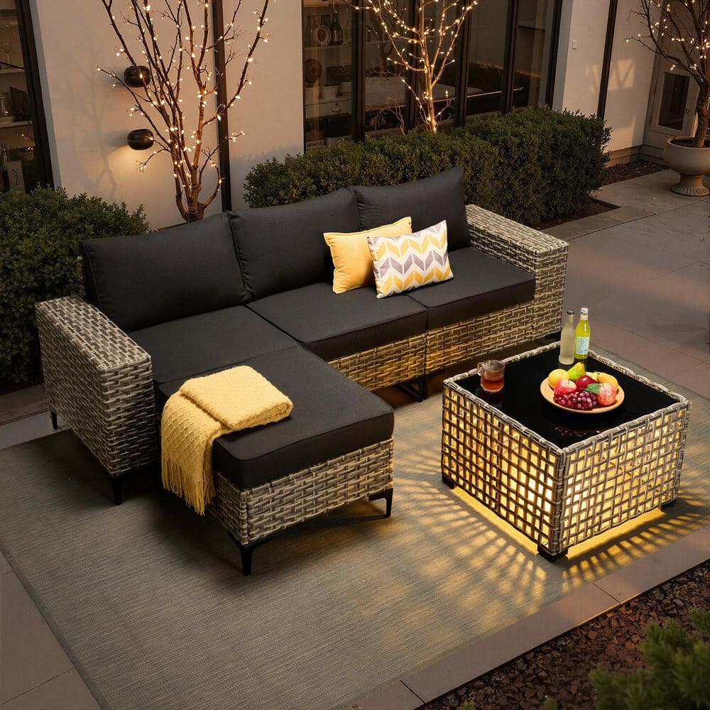Versa 5-Piece Wicker Outdoor Sectional Sofa Set with Ottoman, Solar Lighted Coffee Table and Black Cushions