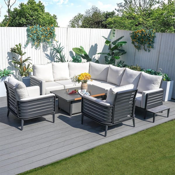 DIRECT WICKER Inlay Dark Grey 7-Piece Aluminum Patio Conversation Set with Beige Cushions, a Coffee Table
