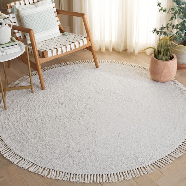 Easy Care Ivory 4 ft. x 4 ft. Modern Solid Fringe Round Area Rug