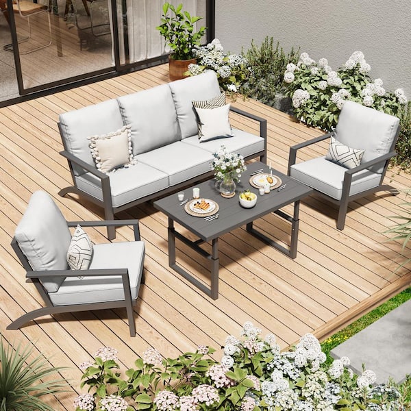 Zeus & Ruta 4-Piece Black Aluminum Outdoor Conversation Set with Light Gray Cushions and 1-Rectangular Coffee Table