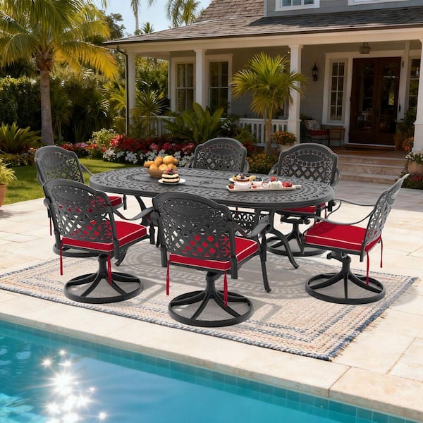 Isabella 7-Piece Cast Aluminum Patio Outdoor Dining Set with Oval Dining Table, 6 Swivel Chairs and 6 Red Cushions