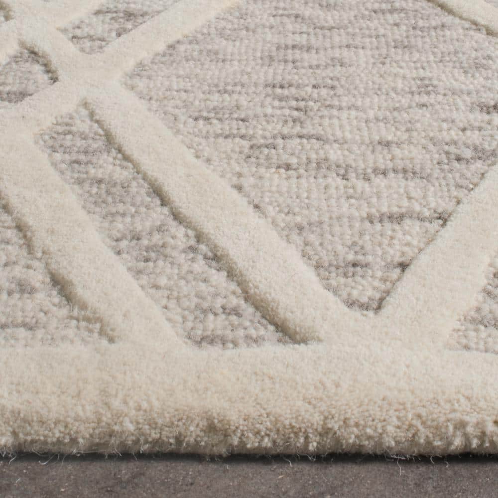 Handmade Elegance Light Brown & Ivory Wool 8' x 10' Area Rug