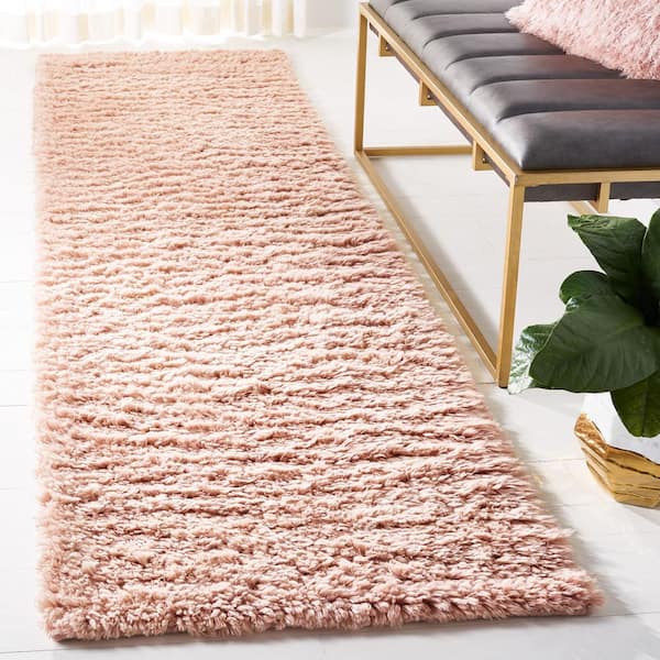 Casablanca 2 ft. x 9 ft. Pink Flokati Solid Color Runner Rug