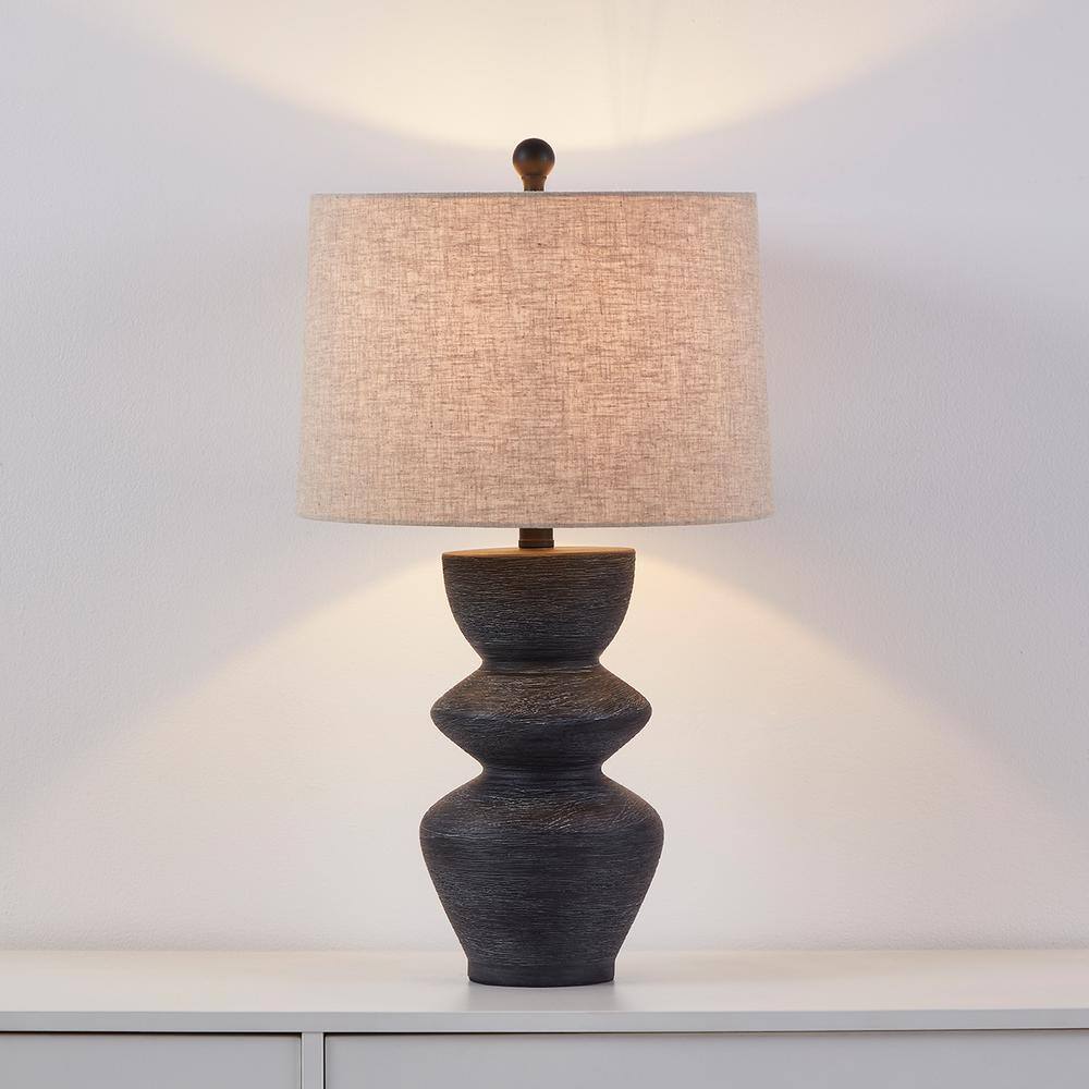 Kawoti 25" Black Distressed Ceramic Table Lamp with Beige Shade